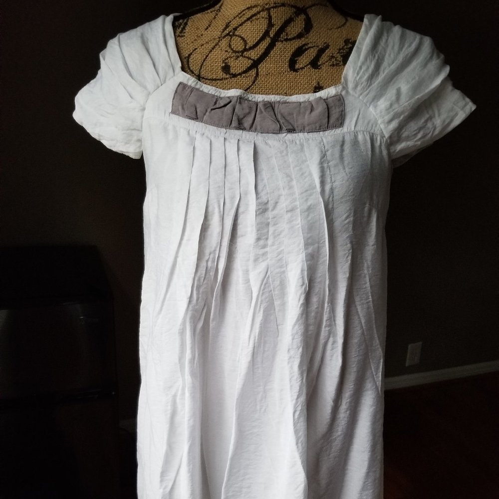 Cute white pleated detail cap sleeve dress